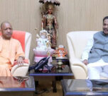 yogi adityanath with vinod tawde